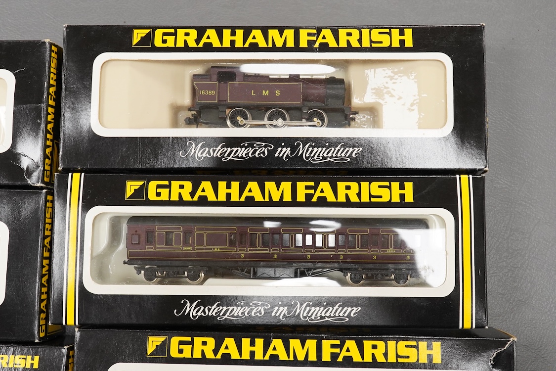 Thirteen N gauge railway by Graham Farish, etc., including two locomotives; a BR Class 4 0-6-0 tender locomotive, 4232, and an LMS 0-6-0T locomotive, 16389, together with two bogie coaches, eight freight wagons, and a Pe